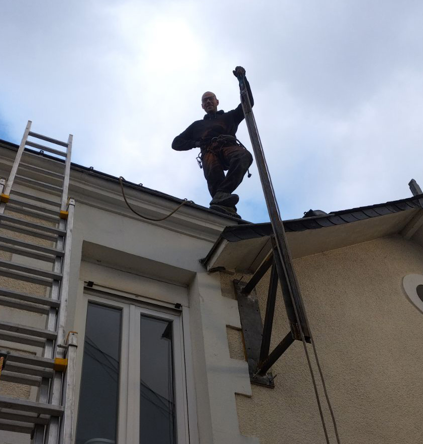 Artisan en toiture